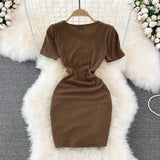 Spice Girl round neck chest hollowed out elastic tight drawstring short Hip Wrap Dress HZ1023