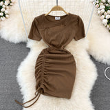 Spice Girl round neck chest hollowed out elastic tight drawstring short Hip Wrap Dress HZ1023