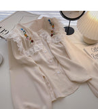 Korean girls' sense of foreign style lace doll neck top HZ1023